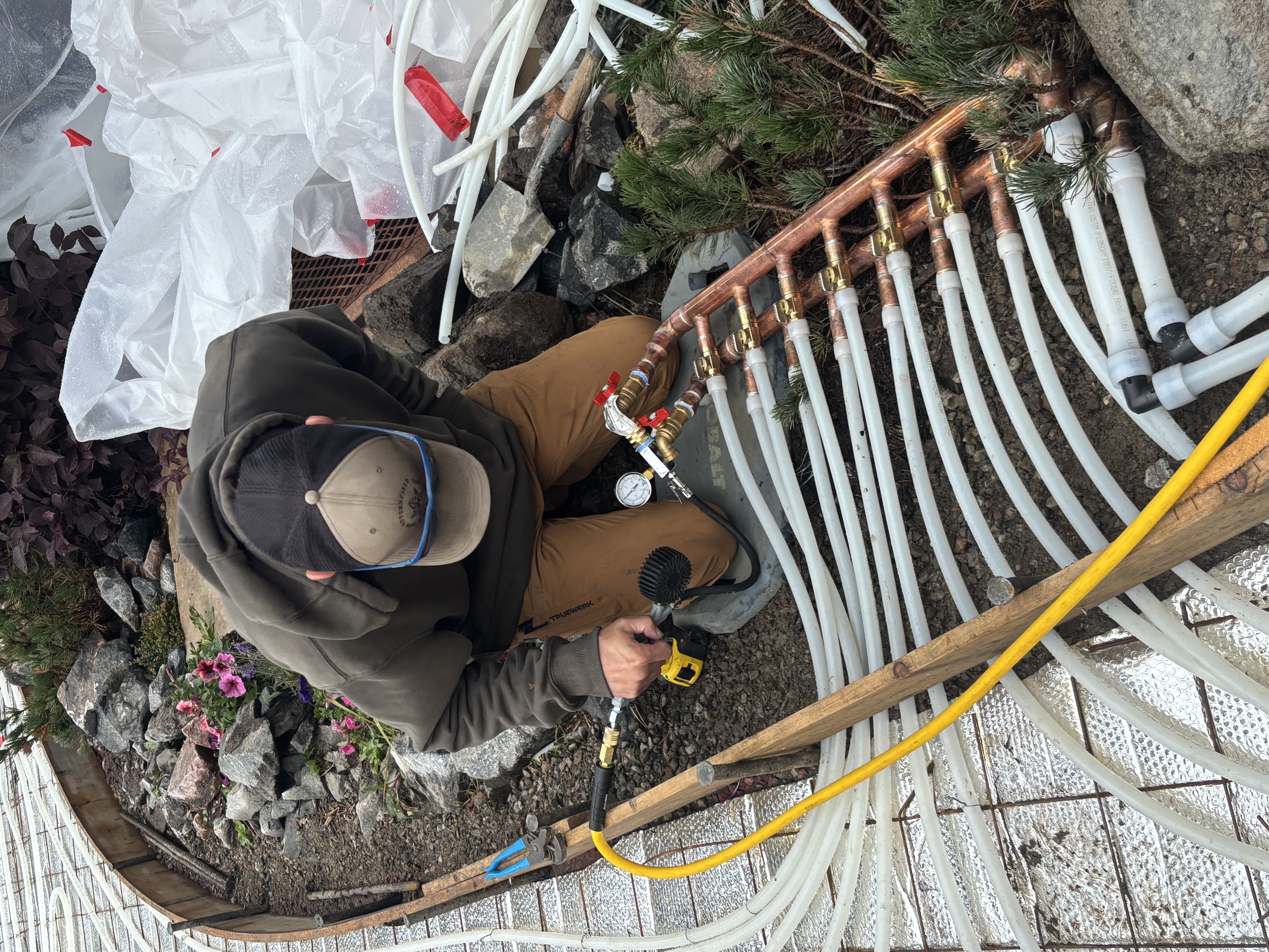 Apprentice plumber in training